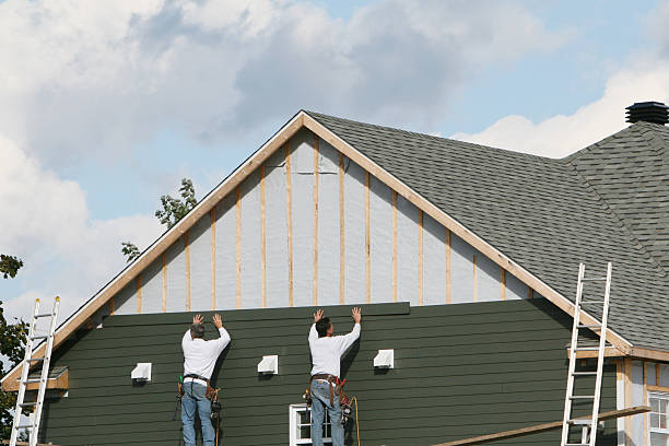 Professional Siding Installation technician working in Polk, OH